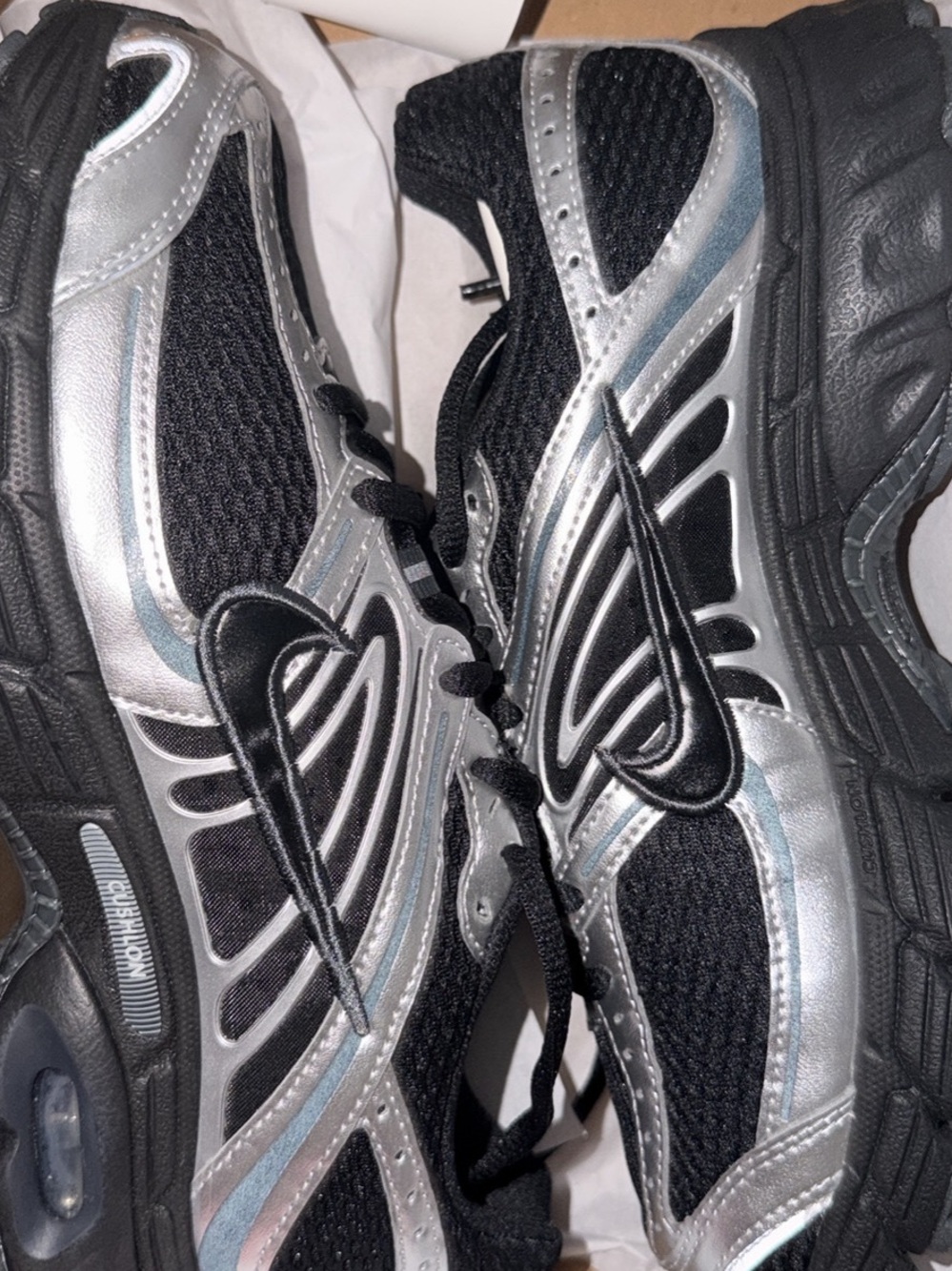Nike Women’s Black and Silver Mesh Running Sneakers